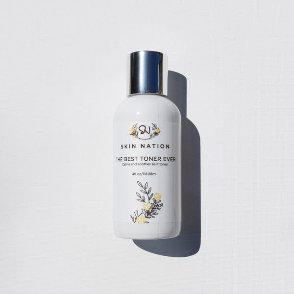 Skincare bottle of Skin Nation Toner labeled 'Skin Nation' on a light gray background