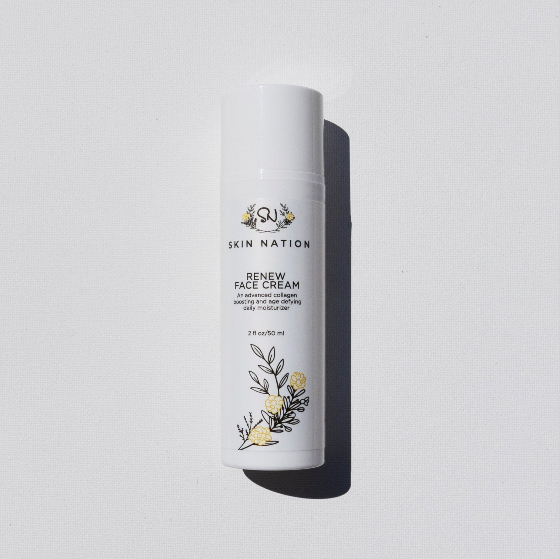 Skincare bottle labeled 'Skin Nation Renew Face Cream' on a light gray background