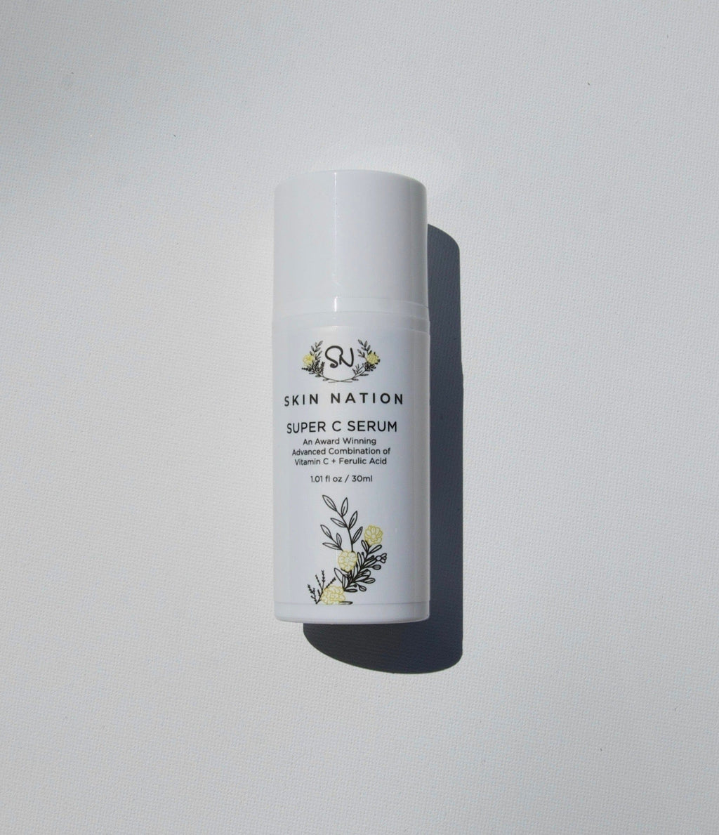 Skin Nation Super C Serum bottle on a light gray background