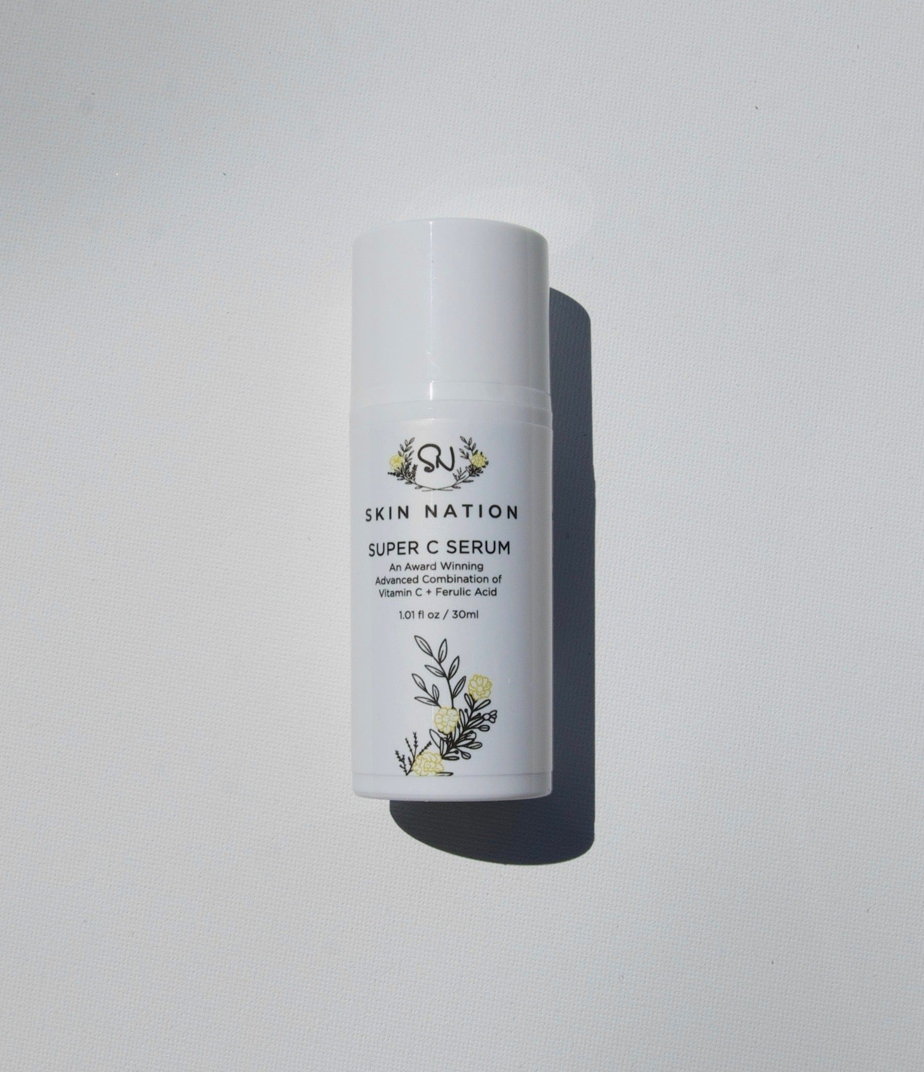 Skin Nation Super C Serum bottle on a light gray background