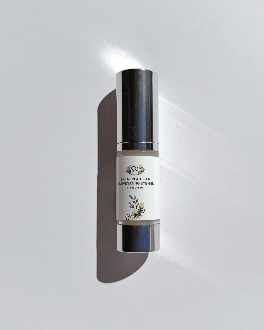Skincare Rejuvenating Eye Gel bottle with visible brand name on a gray background