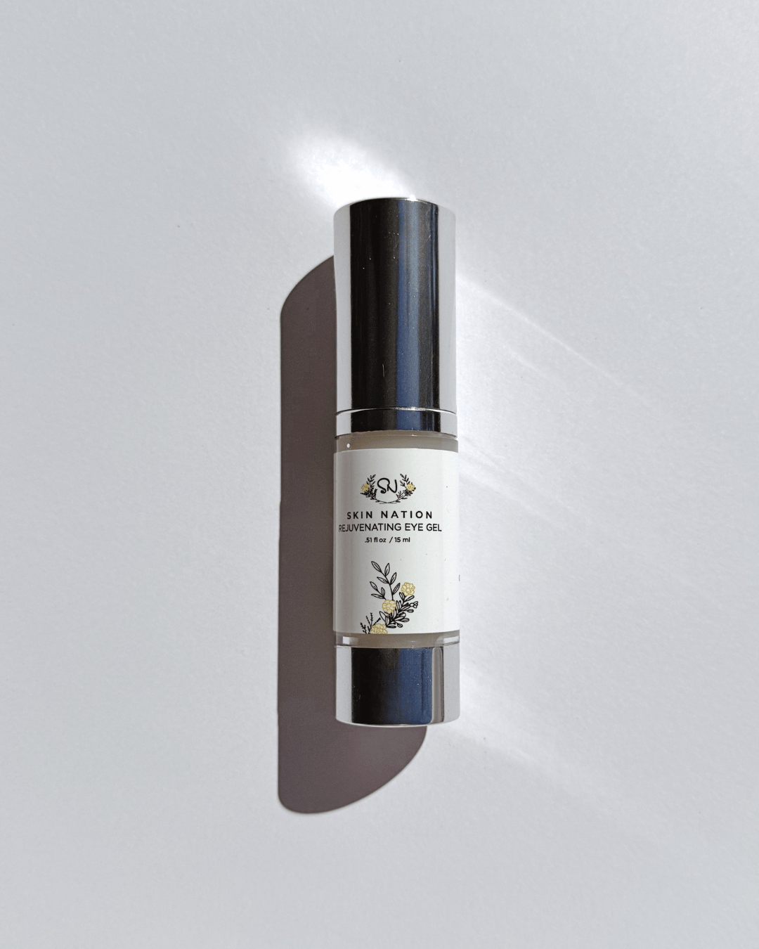 Skincare Rejuvenating Eye Gel bottle with visible brand name on a gray background