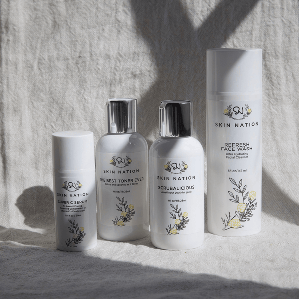 Set of Skin Nation skincare products included in the Transformation Combination on a textured surface with soft shadows.